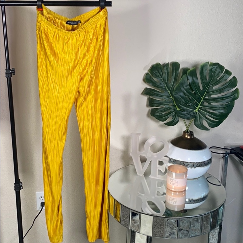 Yellow open leg trousers by PrettyLittleThing